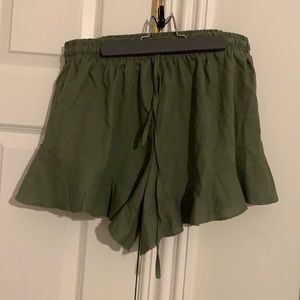 green flowy shorts